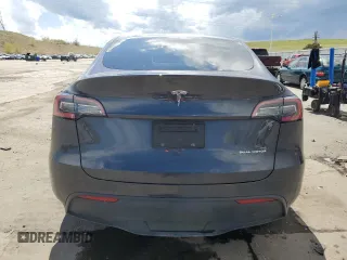2024 Tesla Model Y Long Range с VIN 7SAYGAEEXRF115893, выставлен на аукционе Copart как лот 55174035 с пробегом 68 078 миль миль и Списание • Salvage title. История ставок и продаж доступна на DreamBid. Изображение 6.