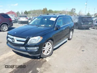 2014 Mercedes-Benz GL-Class GL 450 with VIN 4JGDF7CEXEA277610, listed as a IAAI auction lot 41909424 with 164,437 mi miles. Bid and sale history available at carsss.com. Image 2.
