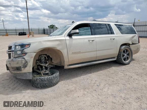 2015 Chevrolet Suburban LT with VIN 1GNSCJKC0FR153454, listed as a Copart auction lot 62672615 with 184,498 mi miles and Salvage title. Bid and sale history available at DreamBid. Image 1.