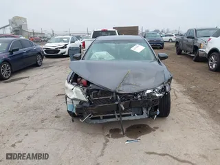 2014 Toyota Camry Hybrid LE with VIN 4T1BD1FK6EU112308, listed as a IAAI auction lot 41175963 with 116,557 mi miles. Bid and sale history available at carsss.com. Image 13.