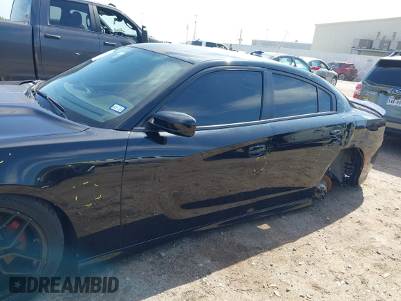 2019 Dodge Charger R/T with VIN 2C3CDXCT2KH575297, listed as a IAAI auction lot 41661339 with 119,854 mi miles and . Bid and sale history available at DreamBid. Image 6.