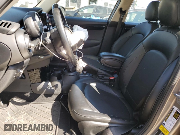 2019 MINI Hardtop 4 Door Cooper with VIN WMWXU1C52K2J02579, listed as a Copart auction lot 53507295 with 94,350 mi miles and Salvage Title. Bid and sale history available at DreamBid. Image 7.