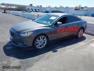 2014 Mazda Mazda6 i Touring with VIN JM1GJ1V52E1104111, listed as a IAAI auction lot 42008695 with 241,149 mi miles. Bid and sale history available at carsss.com. Image 2.