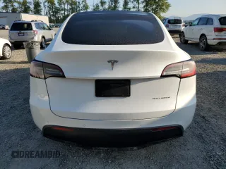 2022 Tesla Model Y Long Range with VIN 7SAYGAEE7NF376795, listed as a Copart auction lot 55113135 with 66,796 mi miles and Salvage Title. Bid and sale history available at carsss.com. Image 6.