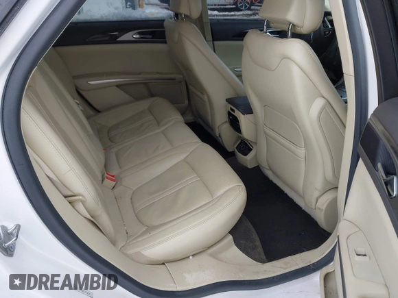 2015 Lincoln MKZ с VIN 3LN6L2JK2FR603436, выставлен на аукционе IAAI как лот 41598218 с пробегом 107 059 миль миль и . История ставок и продаж доступна на DreamBid. Изображение 8.