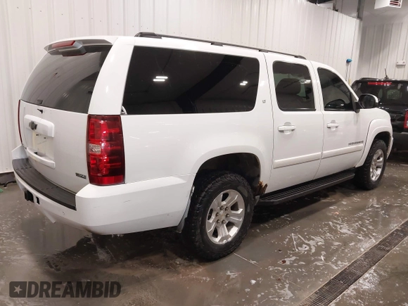 2007 Chevrolet Suburban LT with VIN 1GNFK16307J240138, listed as a IAAI auction lot 42039221 with 212,689 mi miles and . Bid and sale history available at DreamBid. Image 4.