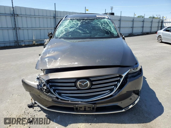 2018 Mazda CX-9 Grand Touring with VIN JM3TCADY5J0200052, listed as a Copart auction lot 55160715 with 68,464 mi miles and Salvage title. Bid and sale history available at DreamBid. Image 5.