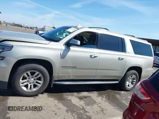 2016 Chevrolet Suburban LT with VIN 1GNSKHKC6GR423963, listed as a IAAI auction lot 42210288 with 151,799 mi miles and . Bid and sale history available at DreamBid. Image 14.