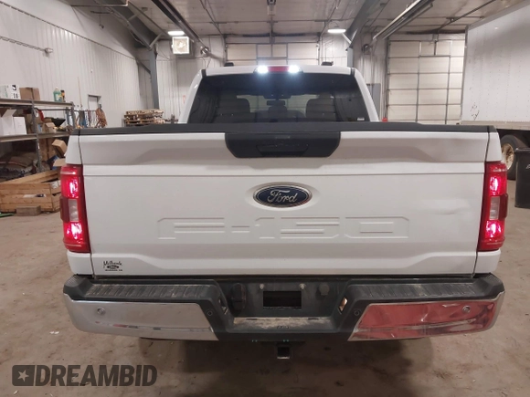 2023 Ford F-150 XL with VIN 1FTFW1ED6PFC14587, listed as a IAAI auction lot 41827273 with 87,267 mi miles. Bid and sale history available at carsss.com. Image 16.