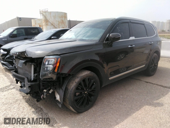 2020 Kia Telluride SX with VIN 5XYP5DHC7LG003935, listed as a IAAI auction lot 32399947 with 82,256 mi miles and . Bid and sale history available at DreamBid. Image 2.