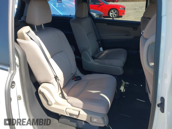2019 Honda Odyssey LX with VIN 5FNRL6H23KB049236, listed as a IAAI auction lot 41633339 with 96,000 mi miles and . Bid and sale history available at DreamBid. Image 8.