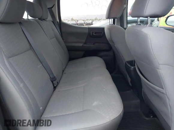 2022 Toyota Tacoma SR with VIN 3TYAX5GN8NT066318, listed as a IAAI auction lot 41739981 with 50,186 mi miles and . Bid and sale history available at DreamBid. Image 8.