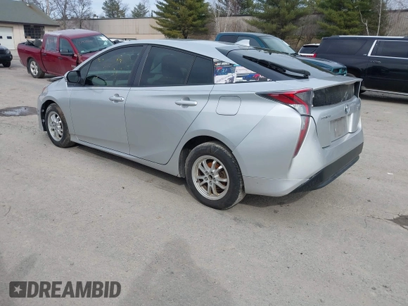 2016 Toyota Prius Two with VIN JTDKBRFUXG3023523, listed as a IAAI auction lot 41757143 with 124,144 mi miles. Bid and sale history available at carsss.com. Image 3.