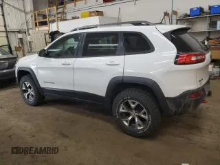2014 Jeep Cherokee Trailhawk z VIN 1C4PJMBS0EW129300, wystawiony jako Copart lot #50782375 z przebiegiem 115 808 mil mil oraz Szkoda całkowita • Salvage title. Historia ofert i sprzedaży dostępna na DreamBid. Obrazek 2.