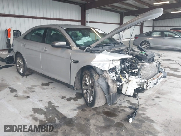 2014 Ford Taurus Limited с VIN 1FAHP2F89EG186147, выставлен на аукционе IAAI как лот 42228000 с пробегом 179 863 миль миль и . История ставок и продаж доступна на DreamBid. Изображение 1.