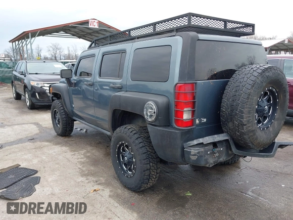 2006 Hummer H3 with VIN 5GTDN136768328477, listed as a IAAI auction lot 41503307 with 186,944 mi miles. Bid and sale history available at carsss.com. Image 3.