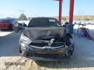 2021 Kia Forte EX with VIN 3KPF54AD0ME284084, listed as a IAAI auction lot 42145578 with 36,843 mi miles and . Bid and sale history available at DreamBid. Image 12.