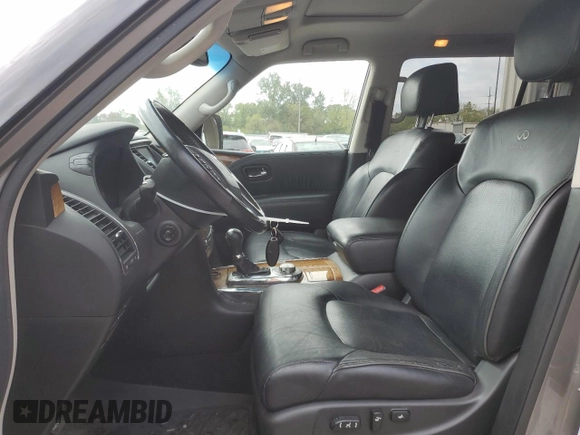 2013 Infiniti QX56 with VIN JN8AZ2NE4D9041702, listed as a Copart auction lot 73759374 with 127,514 mi miles and Salvage Title. Bid and sale history available at carsss.com. Image 7.