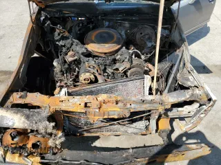 1986 Pontiac Bonneville Brougham z VIN 2G2GR69H9G2241181, wystawiony jako Copart lot #68122684 z przebiegiem Nie podano mil oraz Nie do naprawy • Non repairable. Historia ofert i sprzedaży dostępna na DreamBid. Obrazek 12.