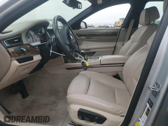 2013 BMW 7 Series 740i with VIN WBAYA6C53DD143952, listed as a Copart auction lot 76064454 with 119,896 mi miles and Clean Title. Bid and sale history available at carsss.com. Image 7.