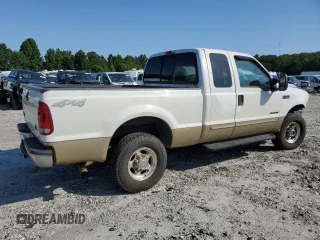 2000 Ford F-250 XL with VIN 1FTNX21F3YEB32295, listed as a Copart auction lot 60867745 with 329,194 mi miles and Salvage title. Bid and sale history available at DreamBid. Image 3.