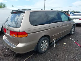 2003 Honda Odyssey EX with VIN 5FNRL18613B085840, listed as a IAAI auction lot 42121495 with Not Provided miles and . Bid and sale history available at carsss.com. Image 4.