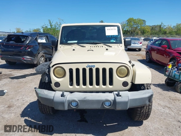 2011 Jeep Wrangler Sahara with VIN 1J4AA5D13BL562732, listed as a IAAI auction lot 41838520 with 148,359 mi miles and . Bid and sale history available at DreamBid. Image 13.