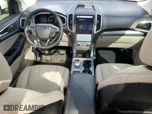 2021 Ford Edge Titanium z VIN 2FMPK4K93MBA52444, wystawiony jako Copart lot #51752835 z przebiegiem 67 137 mil mil oraz Czysty tytuł • Clean title. Historia ofert i sprzedaży dostępna na DreamBid. Obrazek 8.