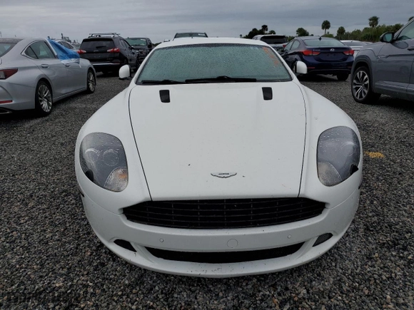 2011 Aston Martin DB9 with VIN SCFFDAAE8BGA13186, listed as a Copart auction lot 74703544 with 0 mi miles and Salvage Title. Bid and sale history available at carsss.com. Image 5.