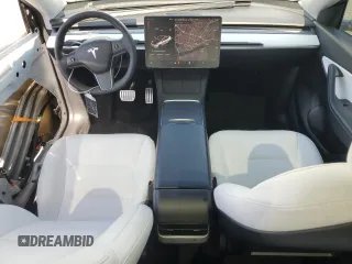 2021 Tesla Model Y Performance z VIN 5YJYGDEF2MF277467, wystawiony jako Copart lot #52410275 z przebiegiem 57 116 mil mil oraz Szkoda całkowita • Salvage title. Historia ofert i sprzedaży dostępna na DreamBid. Obrazek 8.