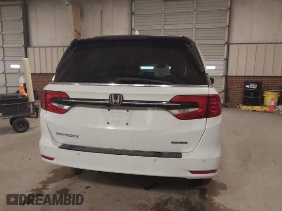 2021 Honda Odyssey Touring with VIN 5FNRL6H80MB026908, listed as a IAAI auction lot 41564765 with 116,453 mi miles. Bid and sale history available at carsss.com. Image 16.