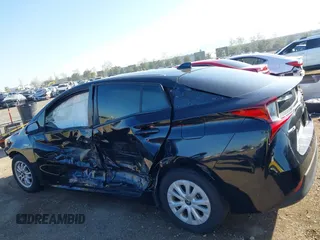 2021 Toyota Prius L Eco z VIN JTDKAMFU1M3134107, wystawiony jako IAAI lot #41763080 z przebiegiem 185 248 mil mil oraz . Historia ofert i sprzedaży dostępna na DreamBid. Obrazek 6.