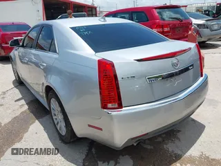 2013 Cadillac CTS Luxury with VIN 1G6DE5E56D0179190, listed as a IAAI auction lot 42726459 with 145,393 mi miles and . Bid and sale history available at DreamBid. Image 3.