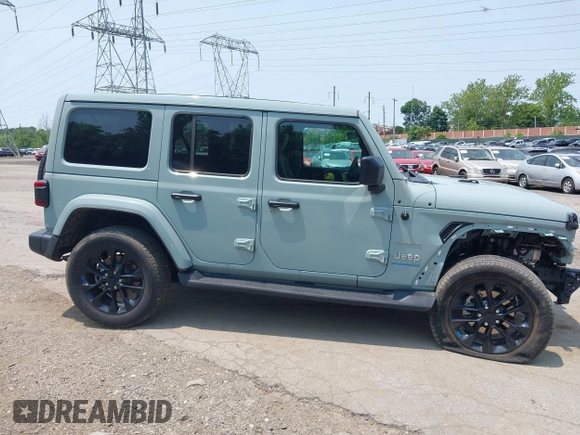2023 Jeep Wrangler Sahara with VIN 1C4JJXP6XPW554741, listed as a IAAI auction lot 42380681 with 15,148 mi miles and . Bid and sale history available at DreamBid. Image 14.