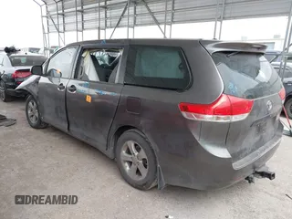 2014 Toyota Sienna L with VIN 5TDZK3DC5ES475204, listed as a IAAI auction lot 41277584 with 125,735 mi miles. Bid and sale history available at carsss.com. Image 3.