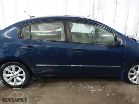 2011 Nissan Sentra 2.0 SR with VIN 3N1AB6AP2BL628843, listed as a IAAI auction lot 41728038 with 112,393 mi miles. Bid and sale history available at carsss.com. Image 13.