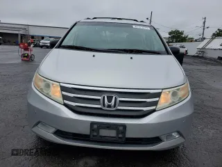2011 Honda Odyssey Touring with VIN 5FNRL5H99BB021223, listed as a Copart auction lot 61171775 with 194,029 mi miles and Salvage title. Bid and sale history available at DreamBid. Image 5.
