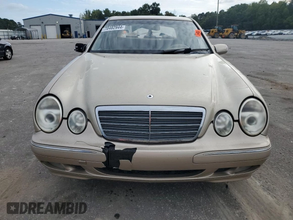 2001 Mercedes-Benz E-Class with VIN WDBJF70JX1B194075, listed as a Copart auction lot 70482944 with 218,319 mi miles and Salvage Title. Bid and sale history available at carsss.com. Image 5.