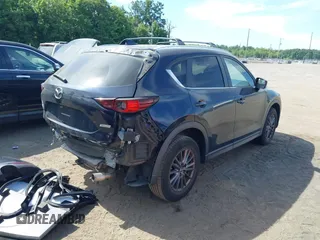 2017 Mazda CX-5 Touring z VIN JM3KFBCL5H0133493, wystawiony jako IAAI lot #39666644 z przebiegiem 125 048 mil mil oraz . Historia ofert i sprzedaży dostępna na DreamBid. Obrazek 4.