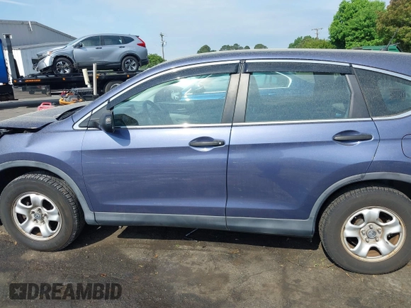 2014 Honda CR-V LX with VIN 3CZRM3H34EG702492, listed as a IAAI auction lot 42096296 with 63,748 mi miles and . Bid and sale history available at carsss.com. Image 14.