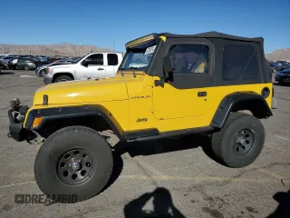 2001 Jeep Wrangler SE with VIN 1J4FA29P61P375915, listed as a Copart auction lot 87288214 with 104,016 mi miles and Salvage Title. Bid and sale history available at carsss.com. Image 1.