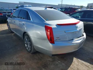 2013 Cadillac XTS with VIN 2G61N5S33D9203389, listed as a IAAI auction lot 41282913 with 72,293 mi miles. Bid and sale history available at carsss.com. Image 3.