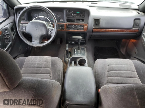 1997 Jeep Grand Cherokee Laredo with VIN 1J4GZ58Y5VC637350, listed as a Copart auction lot 77405444 with 182,482 mi miles and Clean Title. Bid and sale history available at carsss.com. Image 8.