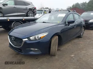 2018 Mazda 3 Touring with VIN 3MZBN1L34JM204883, listed as a IAAI auction lot 41094541 with 125,205 mi miles and . Bid and sale history available at DreamBid. Image 18.