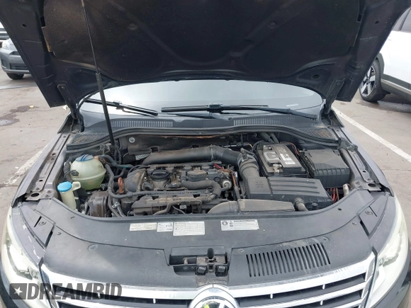 2013 Volkswagen CC Sport with VIN WVWBP7AN6DE504679, listed as a IAAI auction lot 42034362 with 148,527 mi miles. Bid and sale history available at carsss.com. Image 10.