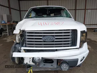 2011 Ford F-150 XL with VIN 1FTFW1EF3BFB82868, listed as a IAAI auction lot 41172587 with 242,928 mi miles. Bid and sale history available at carsss.com. Image 12.