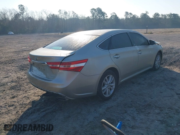 2014 Toyota Avalon Limited with VIN 4T1BK1EB0EU119889, listed as a IAAI auction lot 41653918 with 79,415 mi miles. Bid and sale history available at carsss.com. Image 4.