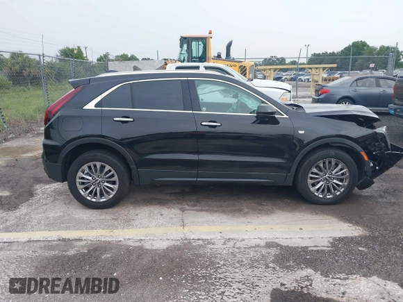 2024 Cadillac XT4 AWD Premium Luxury с VIN 1GYFZDR44RF147956, выставлен на аукционе IAAI как лот 42434595 с пробегом 26 328 миль миль и . История ставок и продаж доступна на DreamBid. Изображение 13.