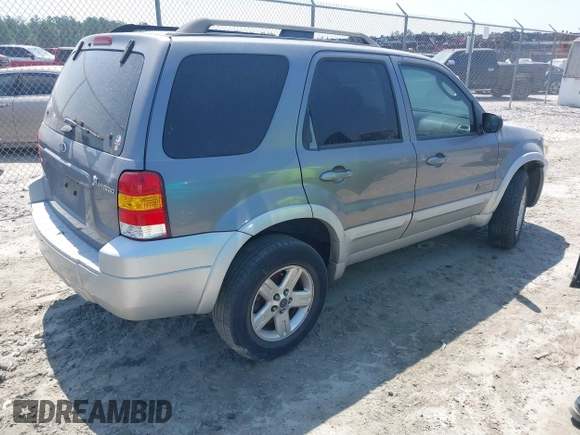 2007 Ford Escape Hybrid with VIN 1FMCU49H87KB34041, listed as a IAAI auction lot 42313413 with Not provided miles and . Bid and sale history available at DreamBid. Image 4.