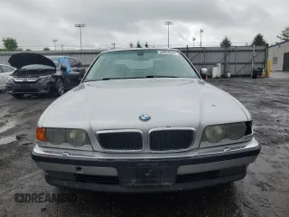 2000 BMW 7 Series 740iL z VIN WBAGH8346YDP11594, wystawiony jako Copart lot #56964665 z przebiegiem 165 495 mil mil oraz Tytuł czysty. Historia ofert i sprzedaży dostępna na DreamBid. Obrazek 5.
